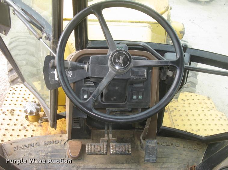 image for item L3987 1995 John Deere 710D backhoe