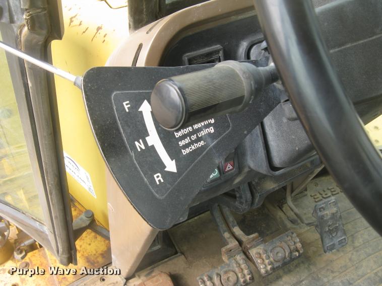 image for item L3987 1995 John Deere 710D backhoe