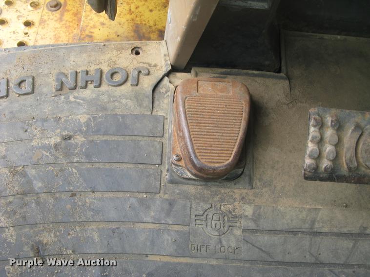 image for item L3987 1995 John Deere 710D backhoe