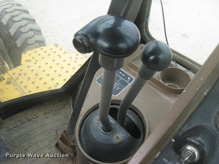 image for item L3987 1995 John Deere 710D backhoe