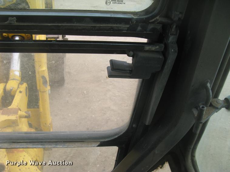 image for item L3987 1995 John Deere 710D backhoe
