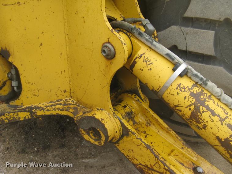 image for item L3987 1995 John Deere 710D backhoe