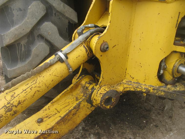 image for item L3987 1995 John Deere 710D backhoe