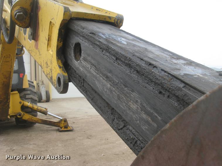 image for item L3987 1995 John Deere 710D backhoe