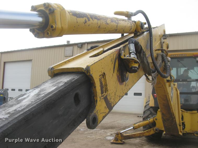 image for item L3987 1995 John Deere 710D backhoe