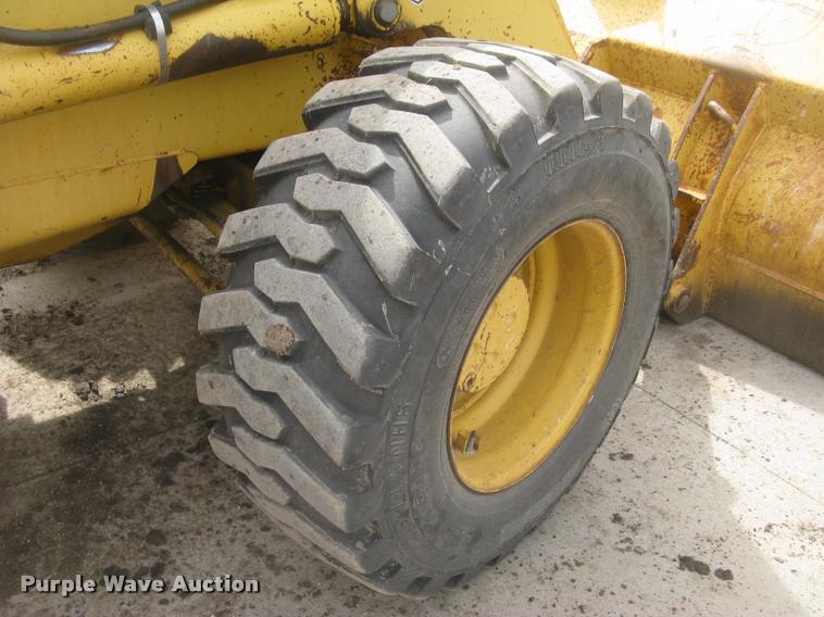 image for item L3987 1995 John Deere 710D backhoe