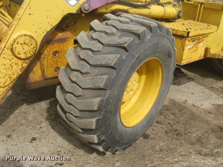 image for item L3987 1995 John Deere 710D backhoe