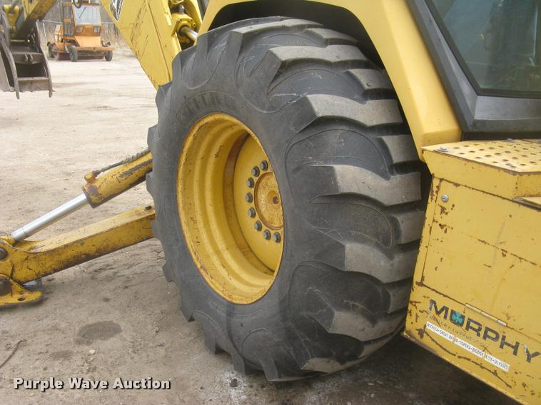 image for item L3987 1995 John Deere 710D backhoe