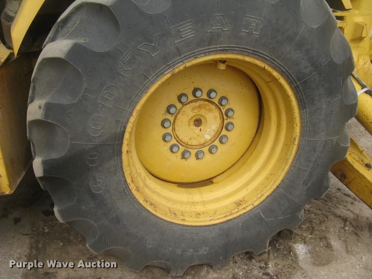 image for item L3987 1995 John Deere 710D backhoe