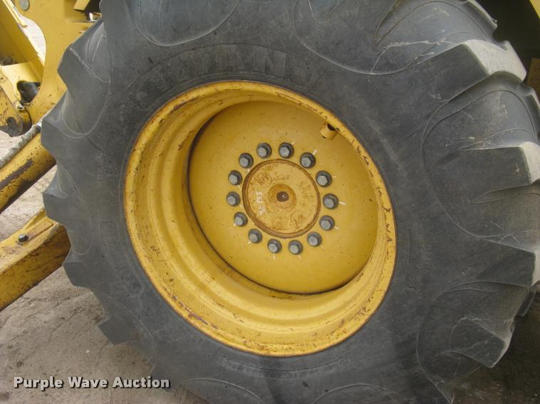 image for item L3987 1995 John Deere 710D backhoe