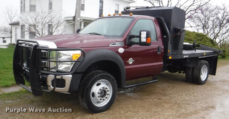 image for item DB3883 2013 Ford F450 Super Duty XLT flatbed pickup truck