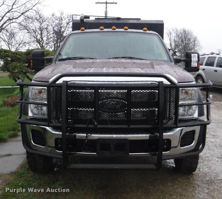 image for item DB3883 2013 Ford F450 Super Duty XLT flatbed pickup truck