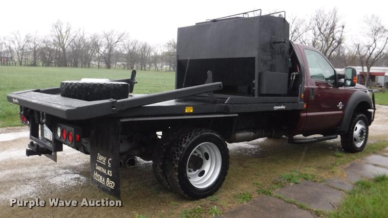 image for item DB3883 2013 Ford F450 Super Duty XLT flatbed pickup truck