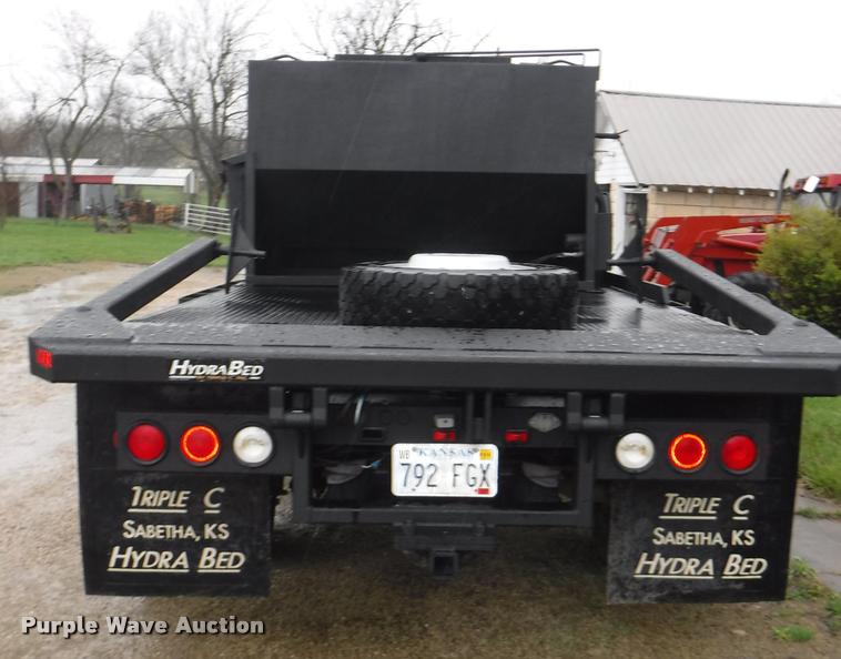 image for item DB3883 2013 Ford F450 Super Duty XLT flatbed pickup truck