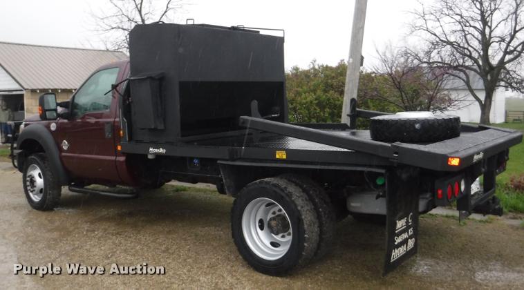 image for item DB3883 2013 Ford F450 Super Duty XLT flatbed pickup truck