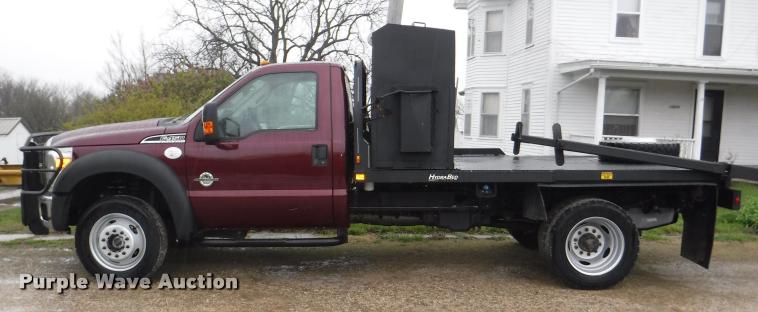 image for item DB3883 2013 Ford F450 Super Duty XLT flatbed pickup truck