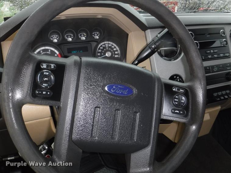 image for item DB3883 2013 Ford F450 Super Duty XLT flatbed pickup truck