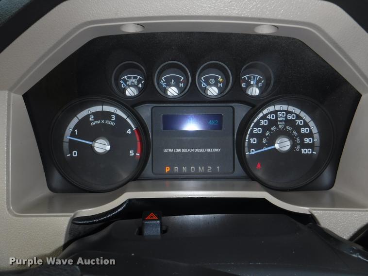 image for item DB3883 2013 Ford F450 Super Duty XLT flatbed pickup truck