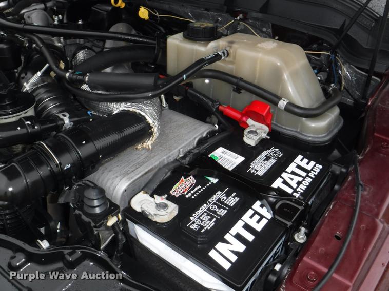 image for item DB3883 2013 Ford F450 Super Duty XLT flatbed pickup truck