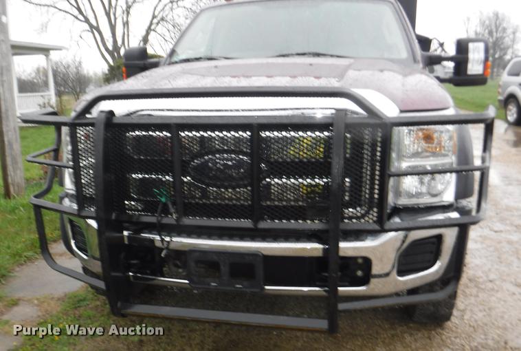image for item DB3883 2013 Ford F450 Super Duty XLT flatbed pickup truck