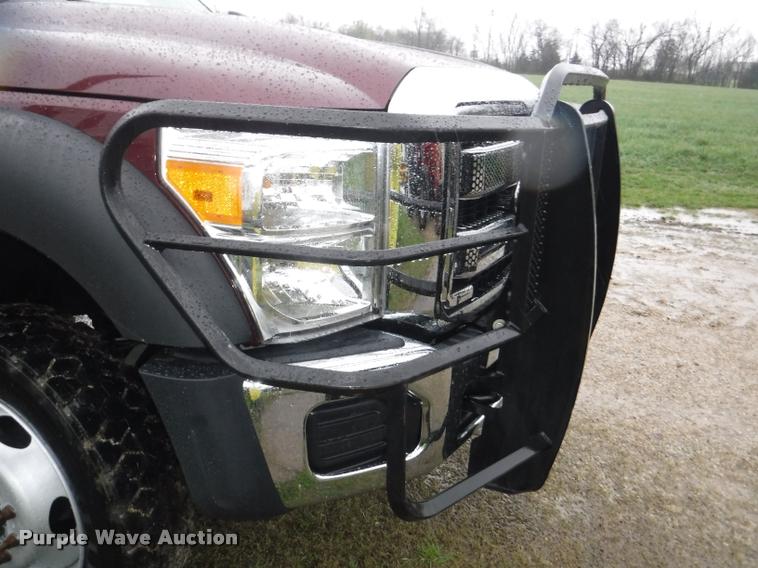 image for item DB3883 2013 Ford F450 Super Duty XLT flatbed pickup truck