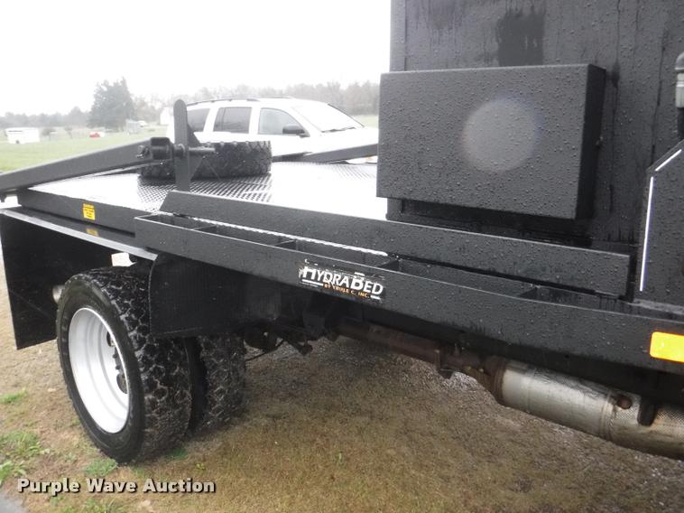 image for item DB3883 2013 Ford F450 Super Duty XLT flatbed pickup truck