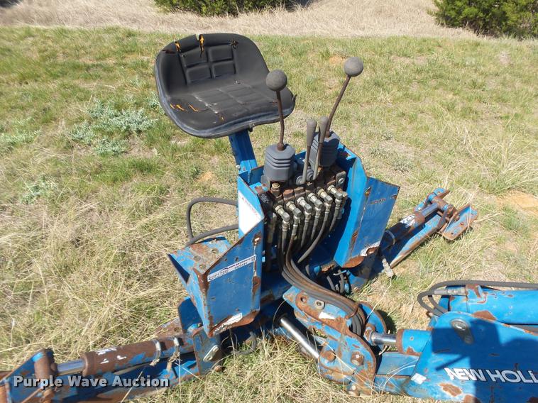 New Holland backhoe attachment in Granbury, TX Item DE9544 sold