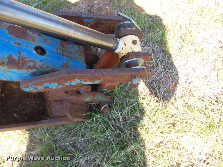 image for item DE9544 New Holland backhoe attachment