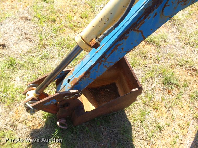 image for item DE9544 New Holland backhoe attachment