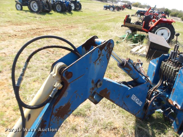 image for item DE9544 New Holland backhoe attachment