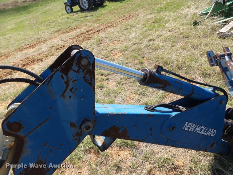image for item DE9544 New Holland backhoe attachment