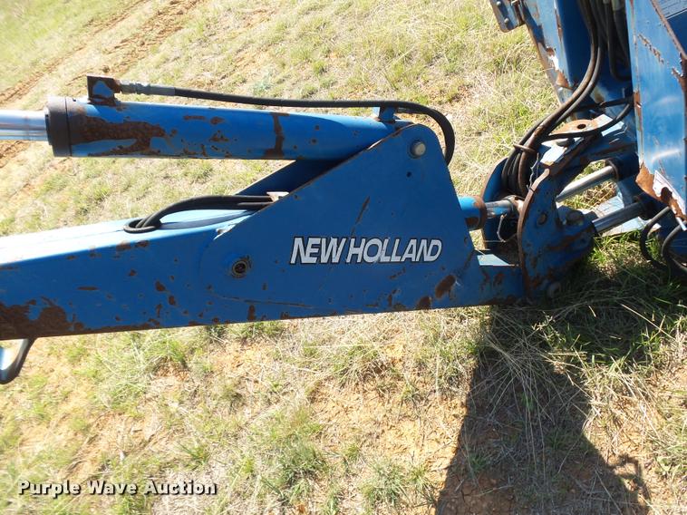 image for item DE9544 New Holland backhoe attachment