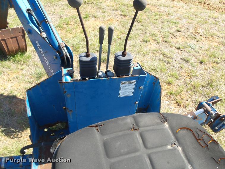 image for item DE9544 New Holland backhoe attachment
