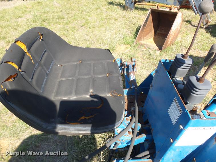 image for item DE9544 New Holland backhoe attachment