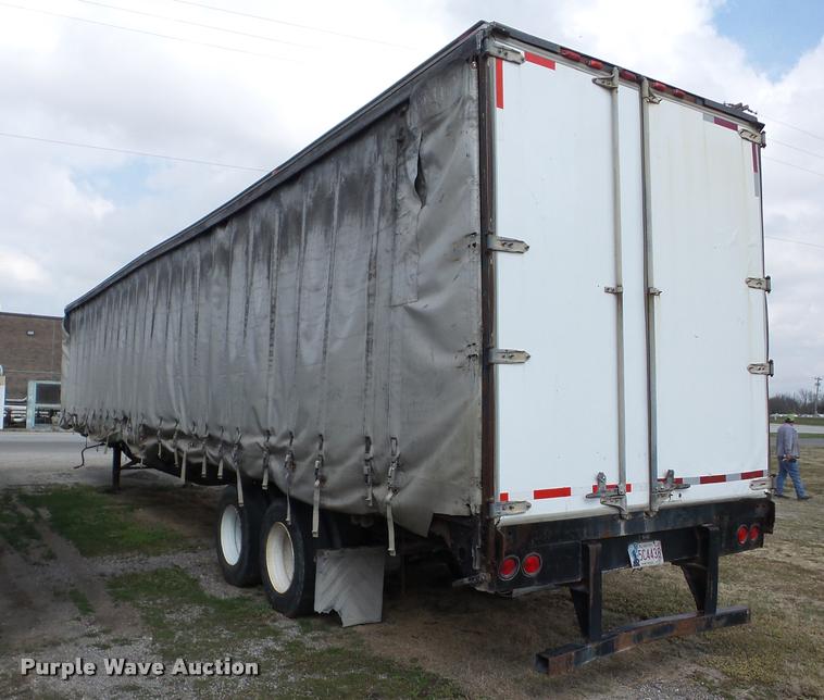 image for item J8656 2001 Utility TS2CHA curtain side dry van trailer