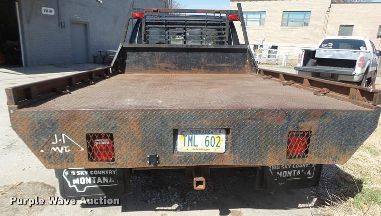 image for item DA0602 1985 Ford F250 XLT Lariat Ext. Cab flatbed pickup truck