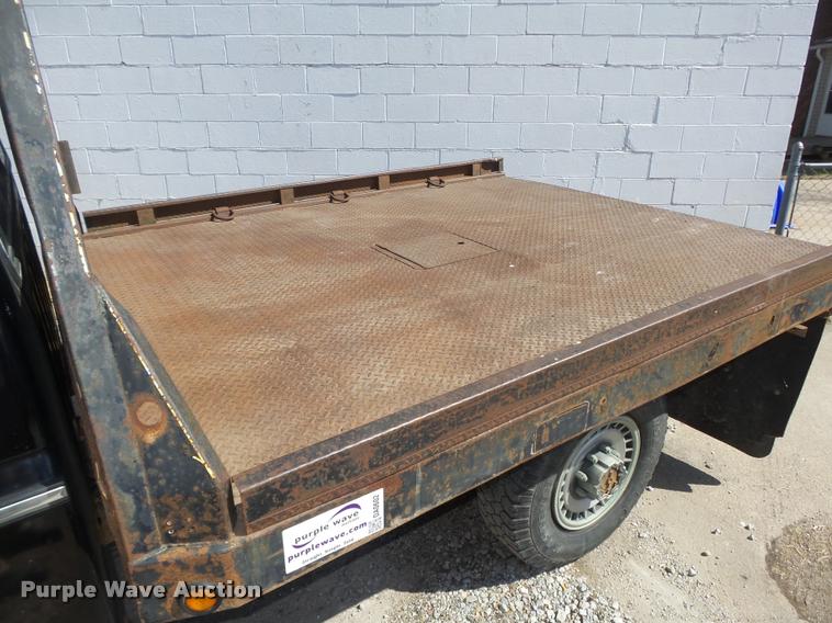 image for item DA0602 1985 Ford F250 XLT Lariat Ext. Cab flatbed pickup truck