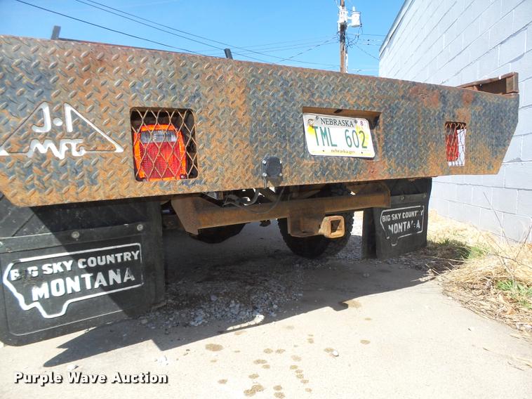 image for item DA0602 1985 Ford F250 XLT Lariat Ext. Cab flatbed pickup truck