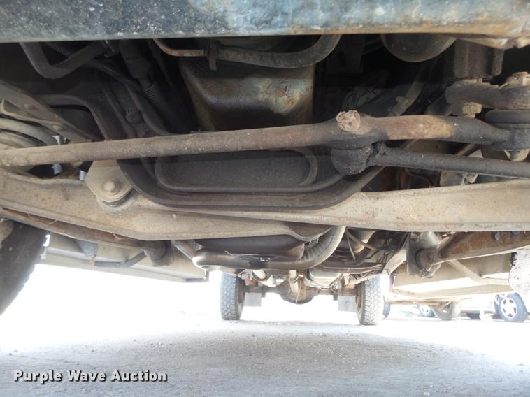 image for item DA0602 1985 Ford F250 XLT Lariat Ext. Cab flatbed pickup truck