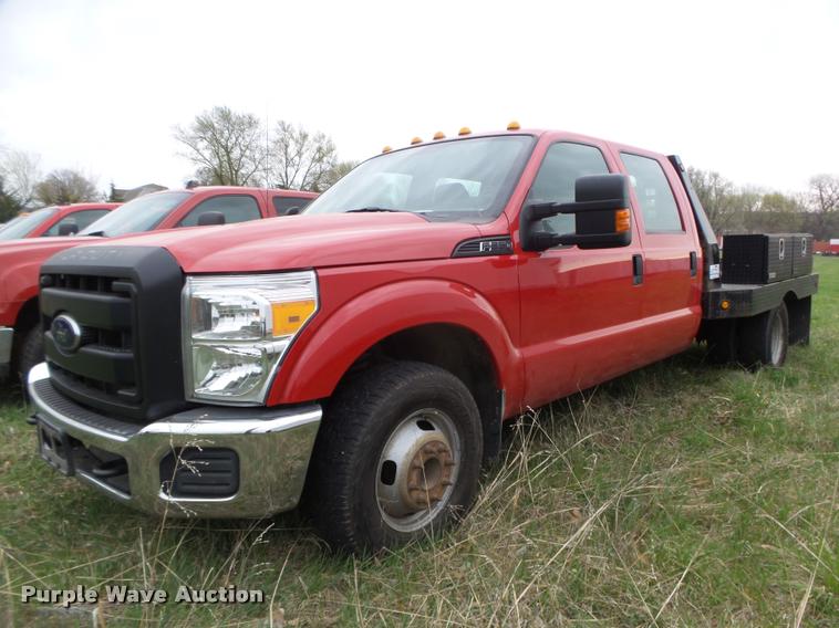 image for item DA0651 2012 Ford F350 Super Duty XL Crew Cab flatbed pickup truck