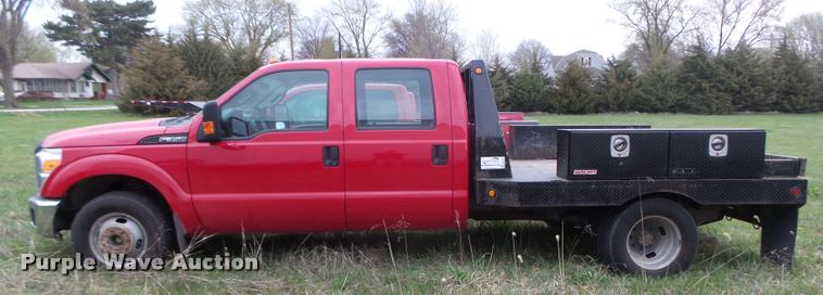 image for item DA0651 2012 Ford F350 Super Duty XL Crew Cab flatbed pickup truck