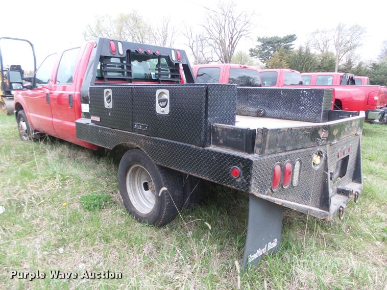 image for item DA0651 2012 Ford F350 Super Duty XL Crew Cab flatbed pickup truck