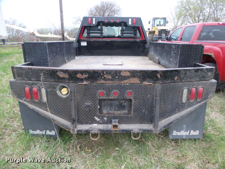 image for item DA0651 2012 Ford F350 Super Duty XL Crew Cab flatbed pickup truck
