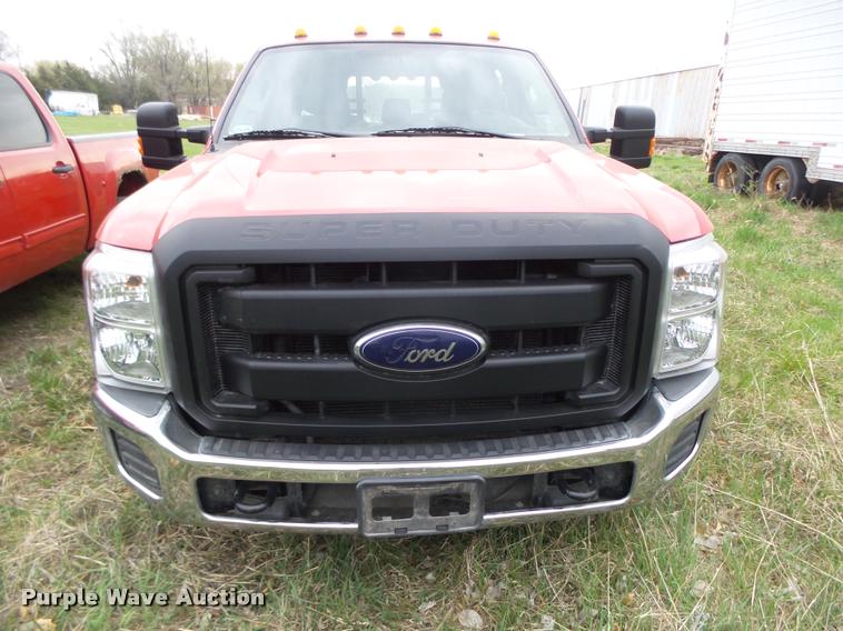 image for item DA0651 2012 Ford F350 Super Duty XL Crew Cab flatbed pickup truck