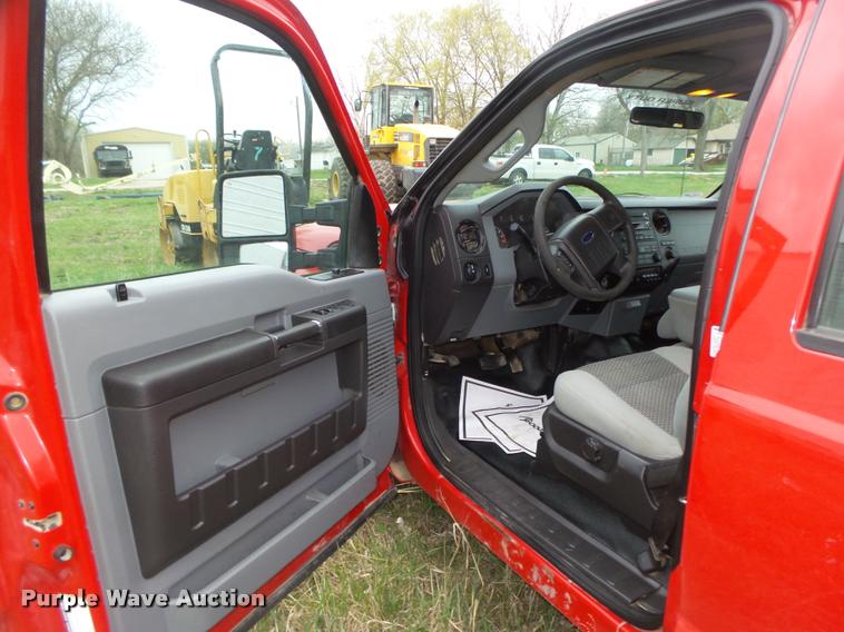 image for item DA0651 2012 Ford F350 Super Duty XL Crew Cab flatbed pickup truck