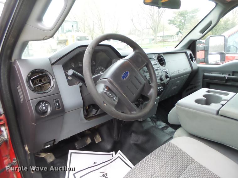 image for item DA0651 2012 Ford F350 Super Duty XL Crew Cab flatbed pickup truck