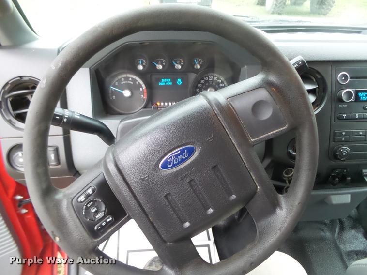 image for item DA0651 2012 Ford F350 Super Duty XL Crew Cab flatbed pickup truck