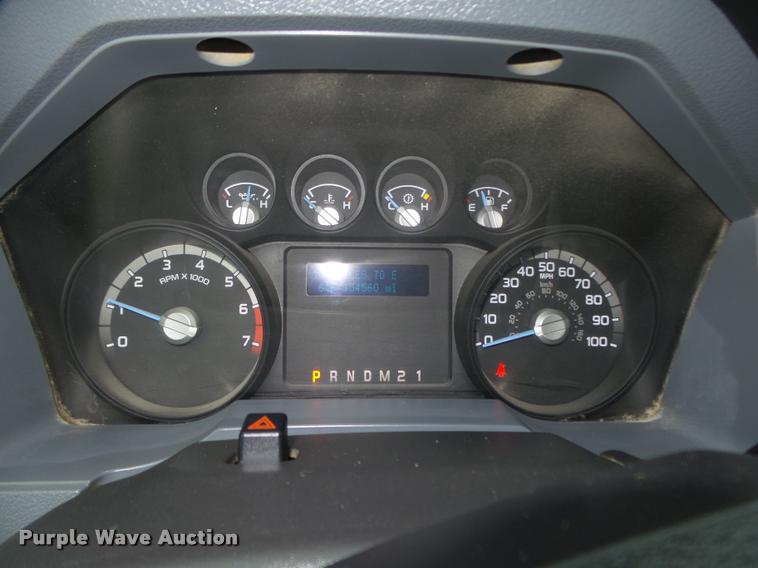 image for item DA0651 2012 Ford F350 Super Duty XL Crew Cab flatbed pickup truck