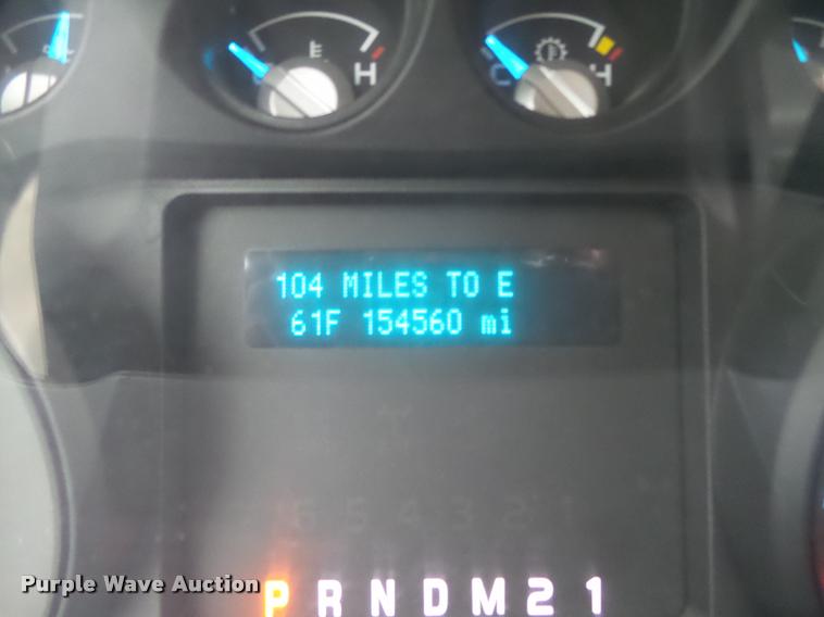 image for item DA0651 2012 Ford F350 Super Duty XL Crew Cab flatbed pickup truck