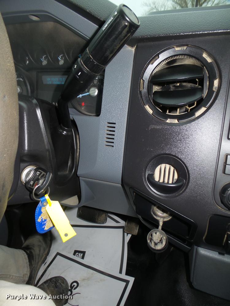 image for item DA0651 2012 Ford F350 Super Duty XL Crew Cab flatbed pickup truck